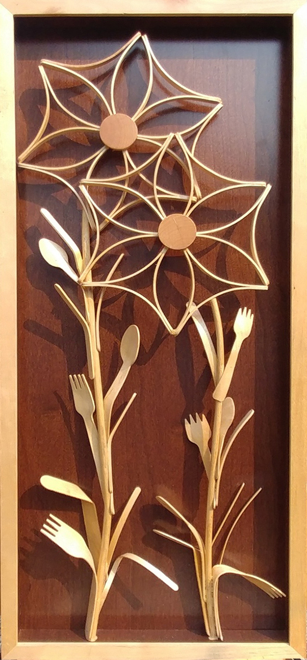 Benting wood flowers artwork by Brad Griffith at the Sequim Community Makerspace Inventing Studio 